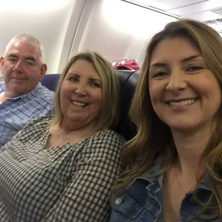 Sarah along with her mother and father